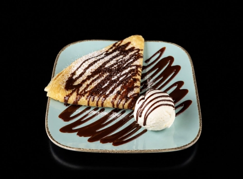 Crepe with ice cream and chocolate